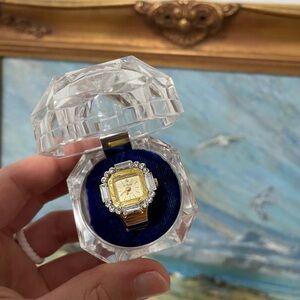 Elegant Gold and Silver Watch with Crystal Accents